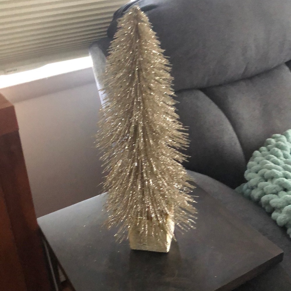 Gold shimmering decorative Christmas tree